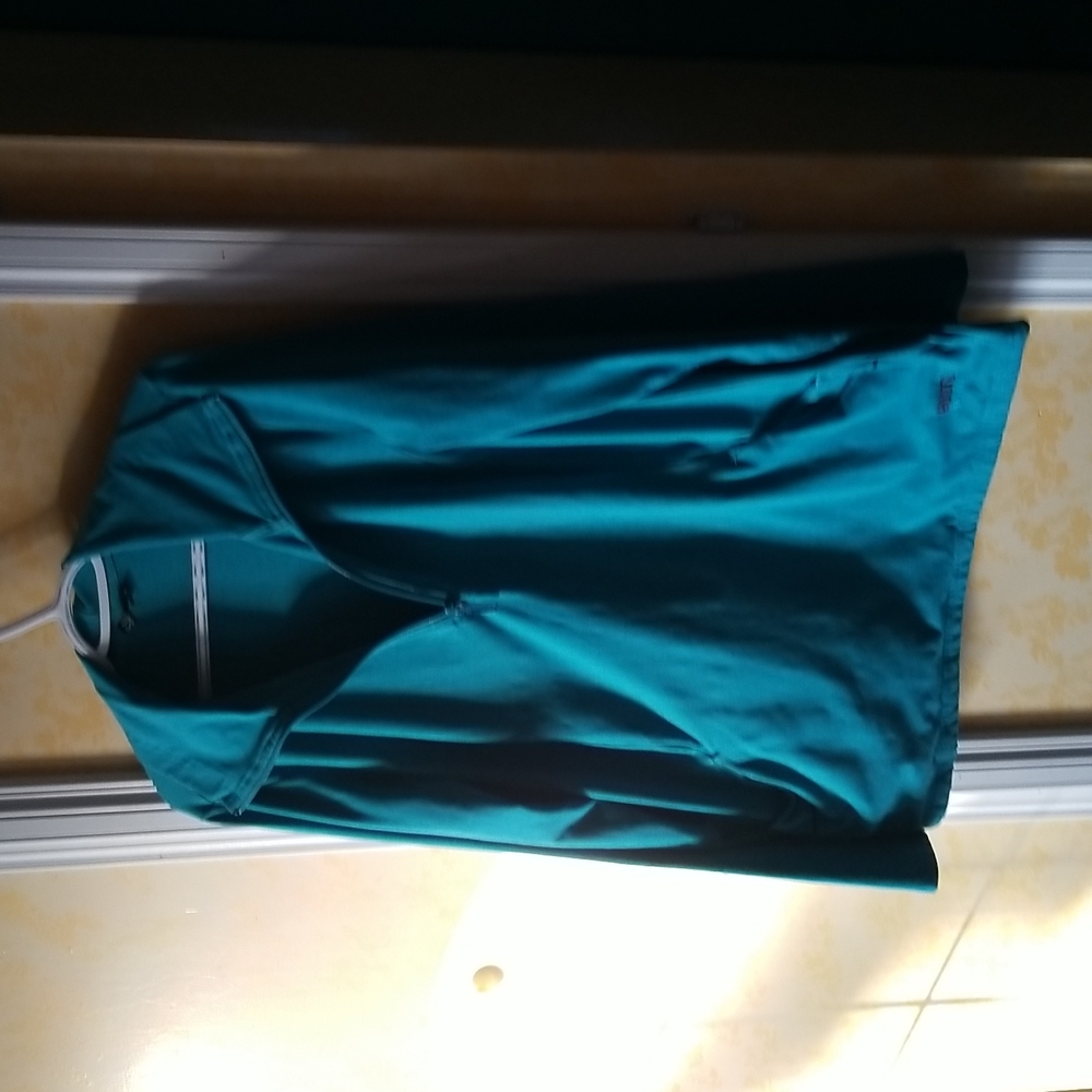 Roots jacket teal color